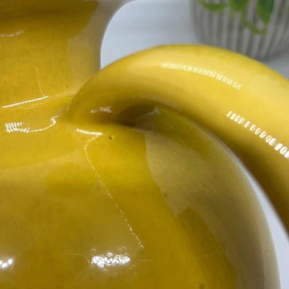 Frankoma Pottery Yellow MCM #82 Carafe dating back to the 1950s.
